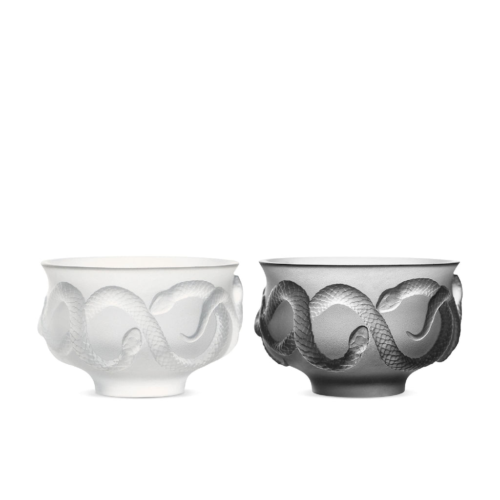 Glaze glass tea cup set in soft light with Year of the Snake relief texture and ebony wood coaster