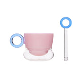 Ciambelle Opaline jade glass coffee cup with matching stirrer in soft light