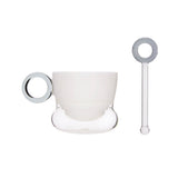 Ciambelle Opaline jade glass coffee cup with matching stirrer in soft light