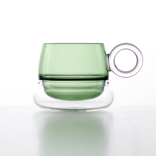 Close-up of Ciambelle Transparent showing clear glass texture, double-layer structure, and refined rim detail