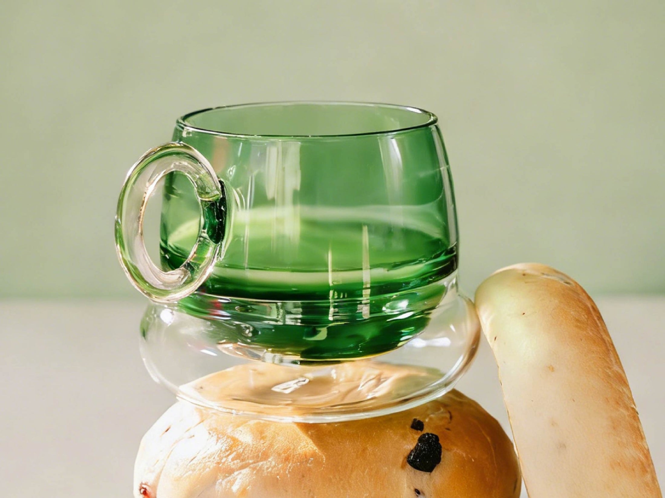 Close-up of Ciambelle Transparent showing clear glass texture, double-layer structure, and refined rim detail