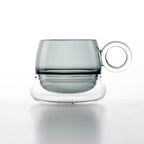 Close-up of Ciambelle Transparent showing clear glass texture, double-layer structure, and refined rim detail