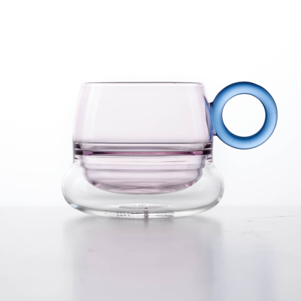 Close-up of Ciambelle Transparent showing clear glass texture, double-layer structure, and refined rim detail