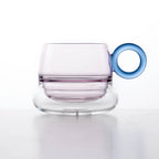 Close-up of Ciambelle Transparent showing clear glass texture, double-layer structure, and refined rim detail