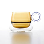 Close-up of Ciambelle Transparent showing clear glass texture, double-layer structure, and refined rim detail