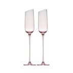 Crystal champagne glasses set of 2 in soft light with ultra-slender stems and a refined blush-toned finish