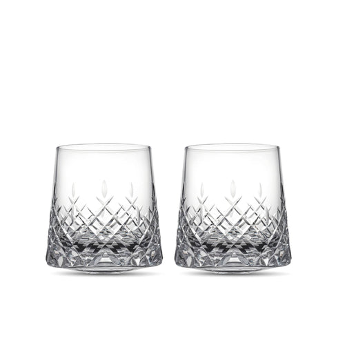 Crystal whiskey glasses set of 2 in soft light with deep-cut facets and diamond-like brilliance