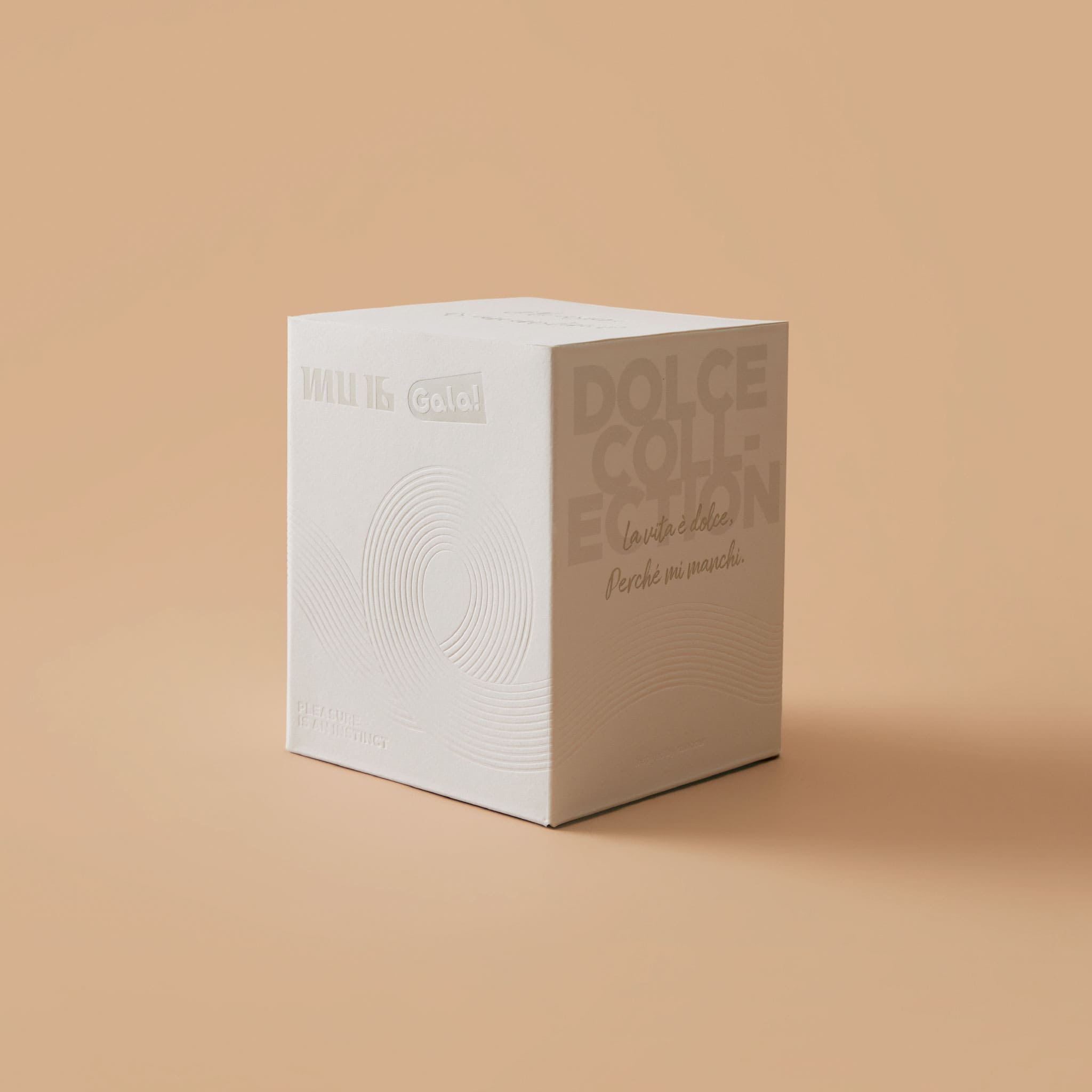 Dolce Antiqua glazed glass cup in soft light with a book-inspired sculptural silhouette