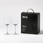 Close-up of hand-blown crystal wine glass showing ultra-thin rim, clear body, and refined stem detail