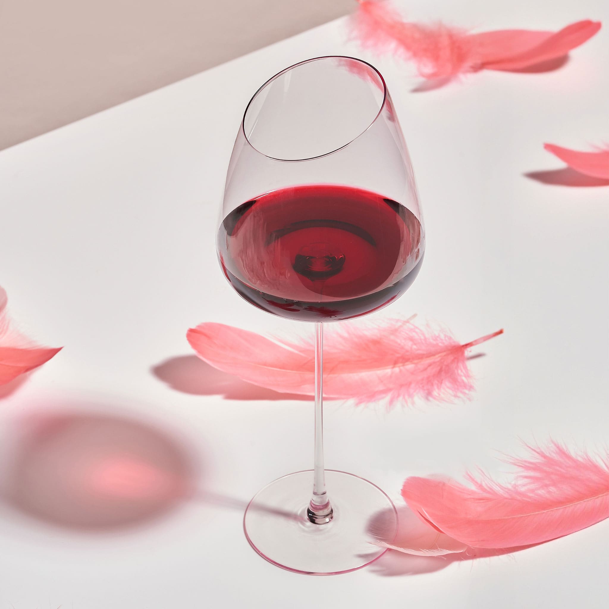 Pink Bordeaux wine glasses set of 2 styled for a quiet wine ritual with a graceful romantic mood