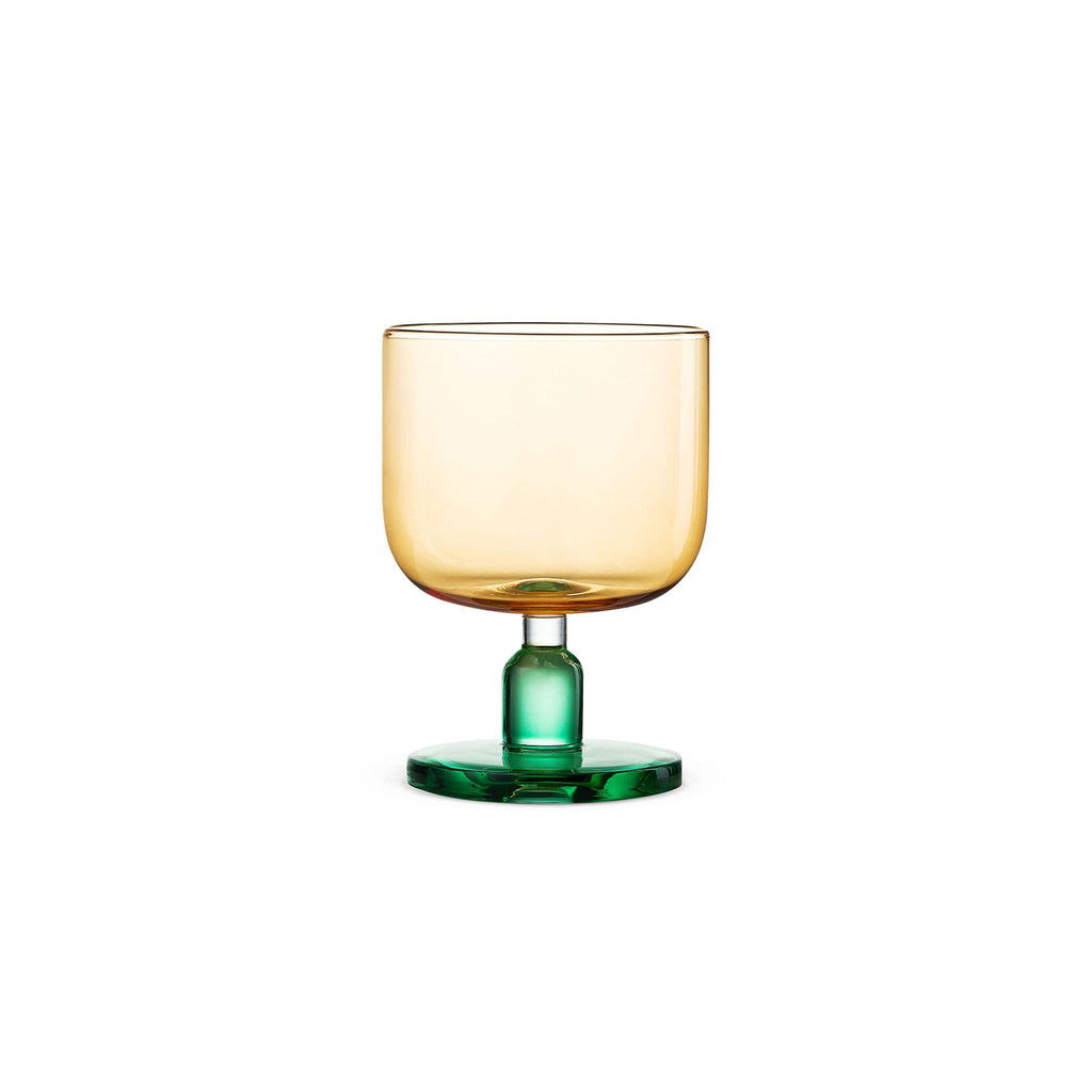 Jelly-inspired glass in soft light with a rounded sculptural silhouette and transparent color