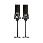 Love Aphrodite Champagne Glass Set in soft light with a tall sculptural silhouette and luminous faceted bowl