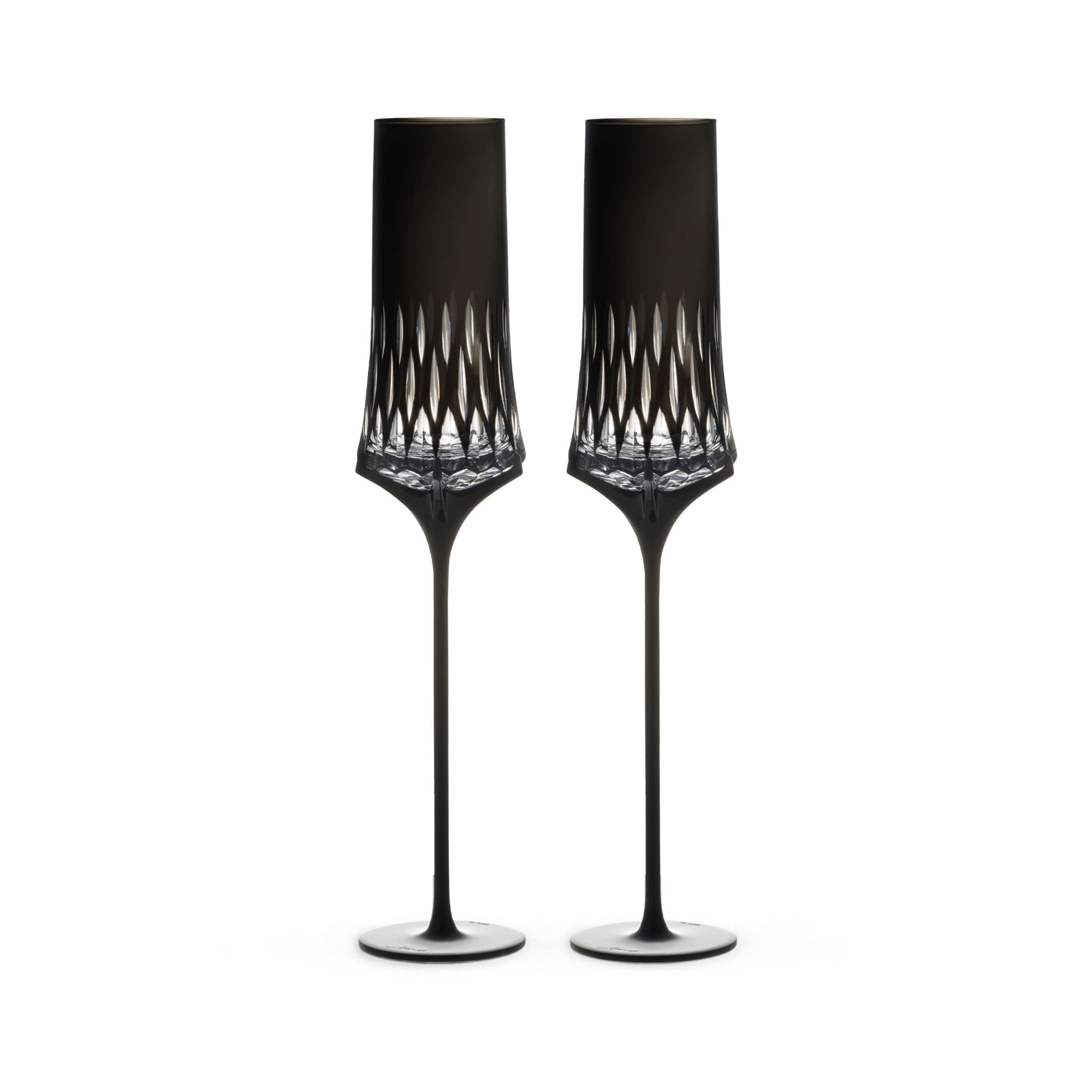 Love Aphrodite Champagne Glass Set in soft light with a tall sculptural silhouette and luminous faceted bowl