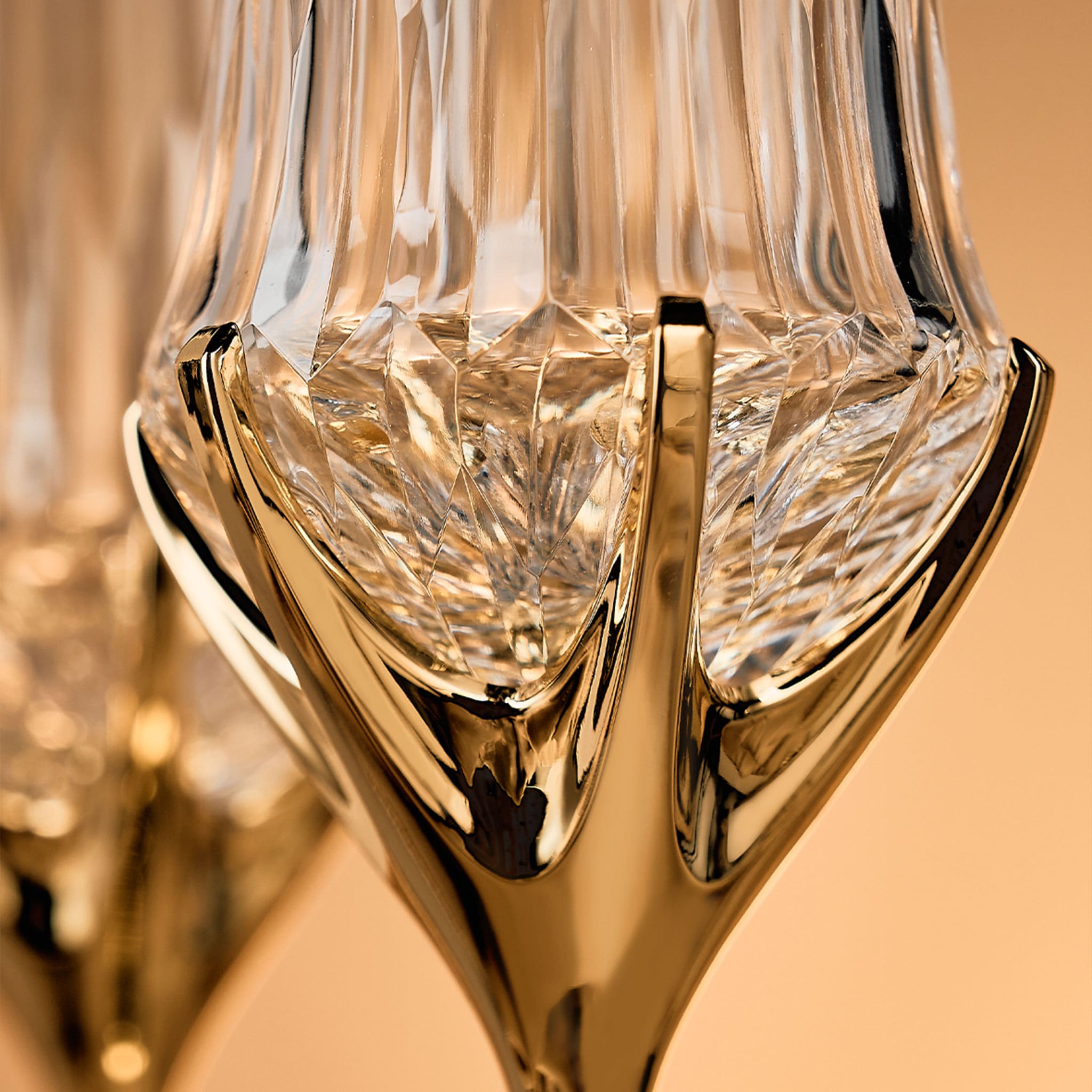 Close-up of Love Cupid champagne glass set showing hand-blown glass, crystal accent, and silver-toned stem detail
