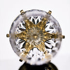 Close-up of Love Cupid champagne glass set showing hand-blown glass, crystal accent, and silver-toned stem detail