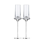 Love Venus Champagne Glass Set in soft light with a tall sculptural silhouette and luminous ring-inspired base