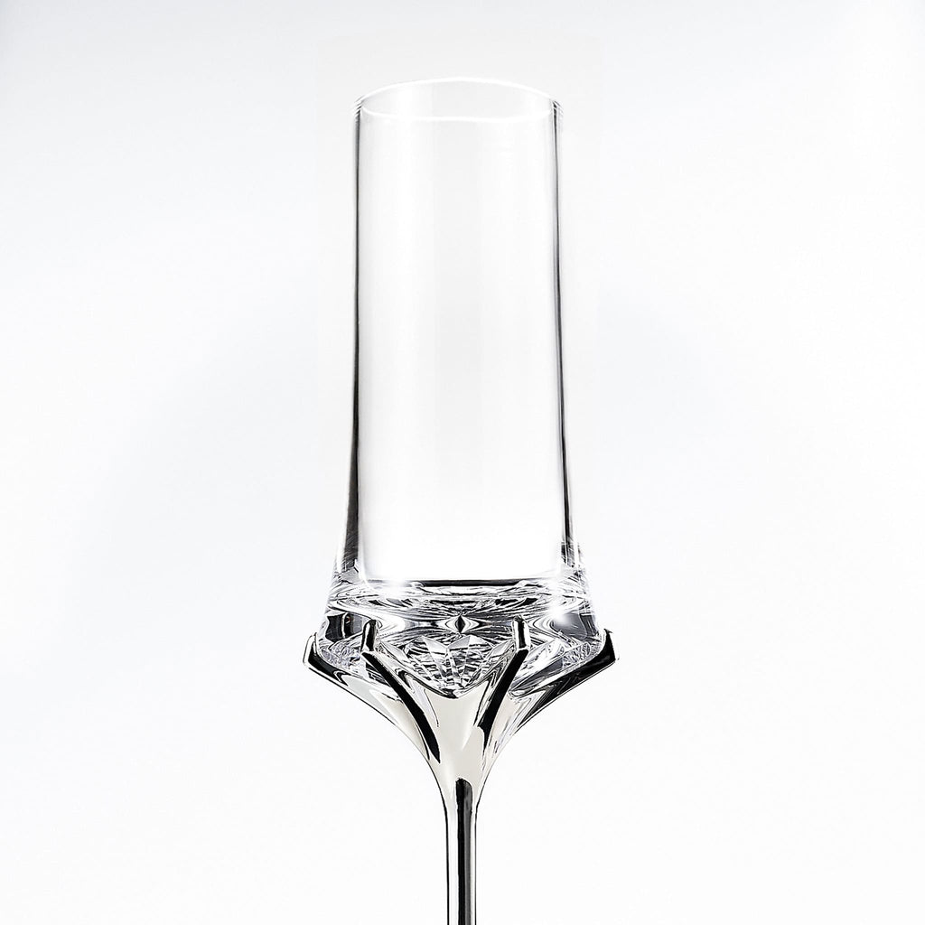 Close-up of Love Venus Champagne Glass Set showing hand-cut glass texture, six-claw setting, and silver-plated stem detail