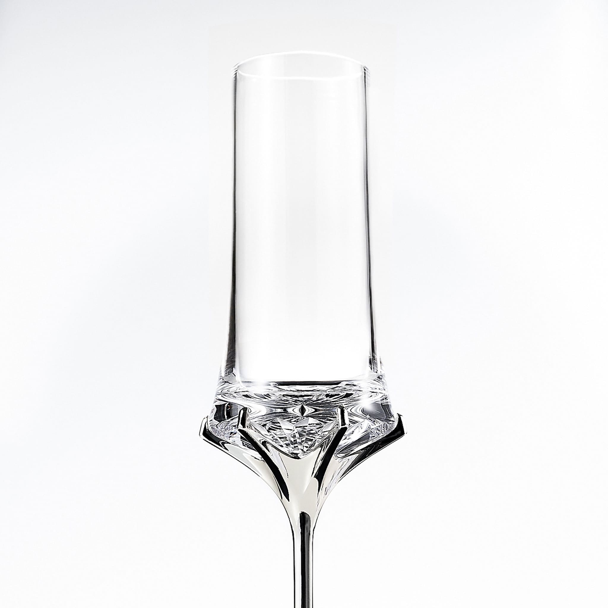 Close-up of Love Venus Champagne Glass Set showing hand-cut glass texture, six-claw setting, and silver-plated stem detail