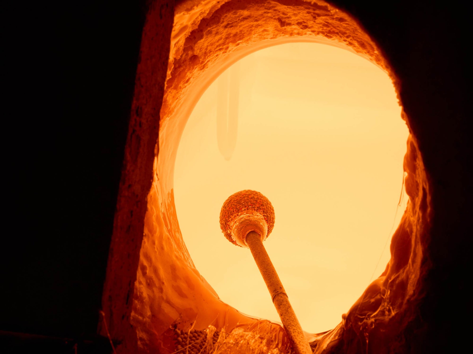 Close-up of Ciambelle Opaline showing glass clarity, jade texture, and refined handle detail