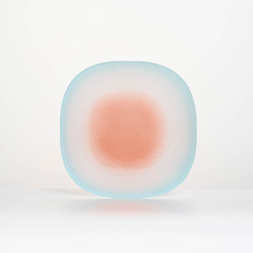 Close-up of Nubi Dessert plate showing matte texture, irregular base pattern, and softly blended color detail