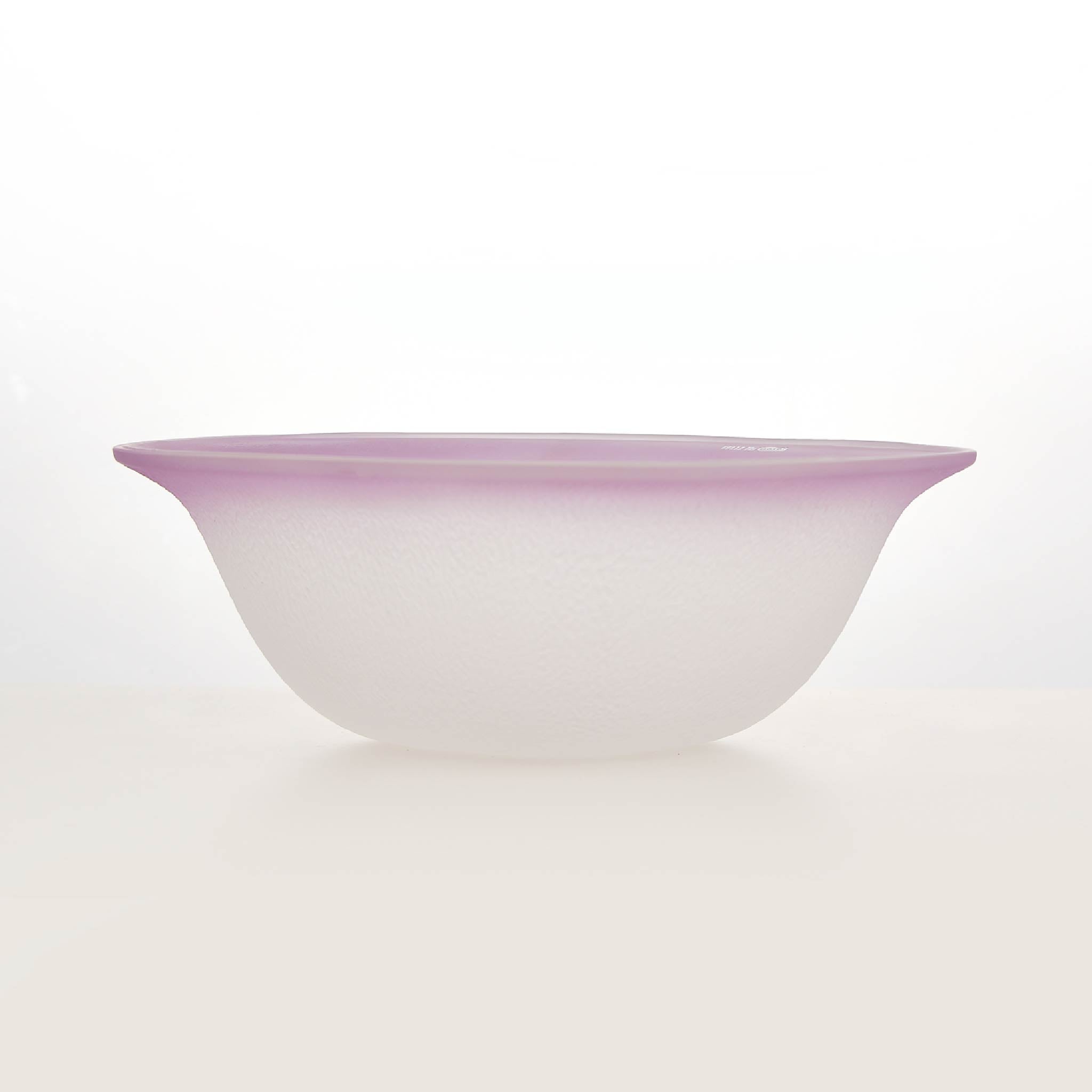 Close-up of Nubi Salad Bowl showing matte texture, irregular base pattern, and softly blended color detail