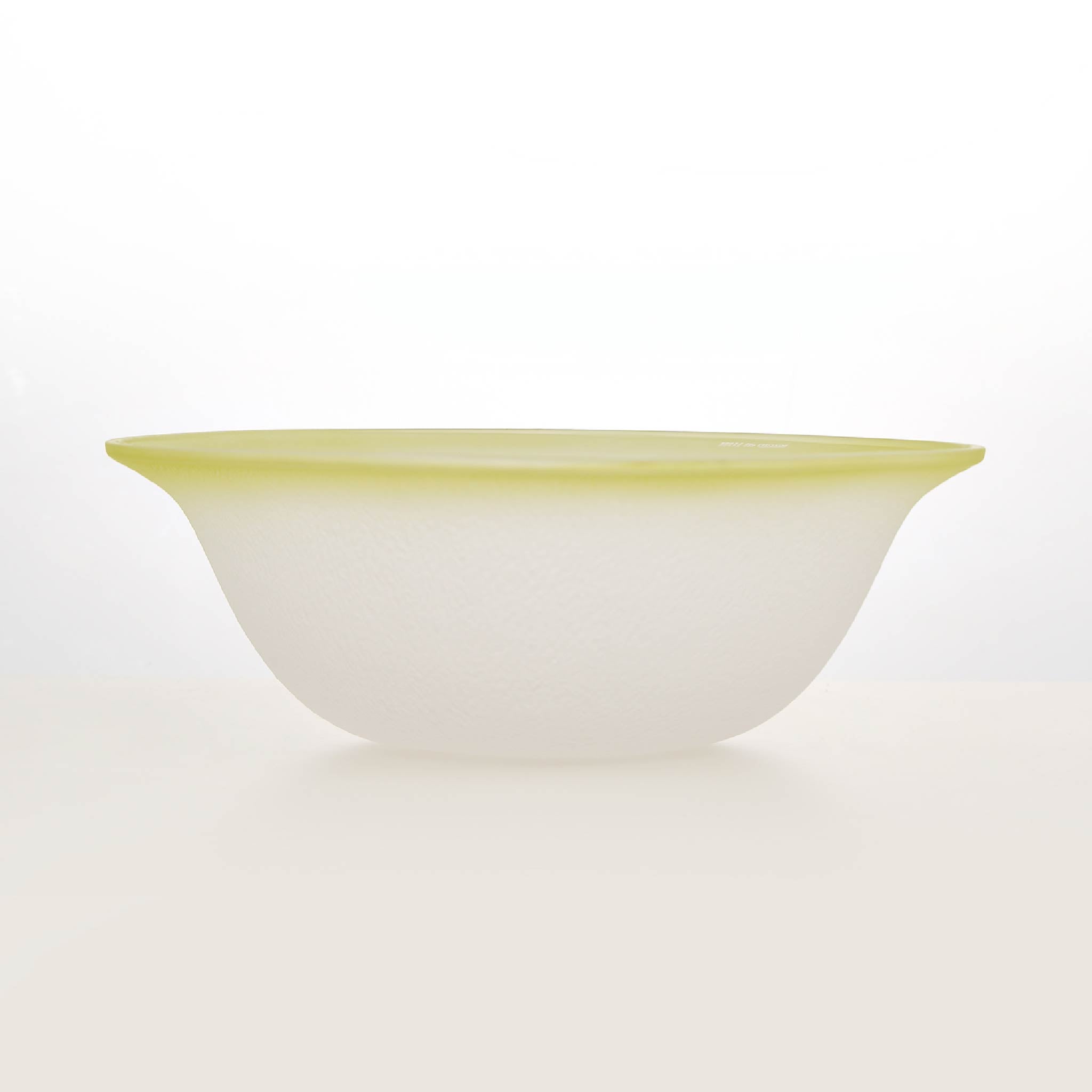 Close-up of Nubi Salad Bowl showing matte texture, irregular base pattern, and softly blended color detail