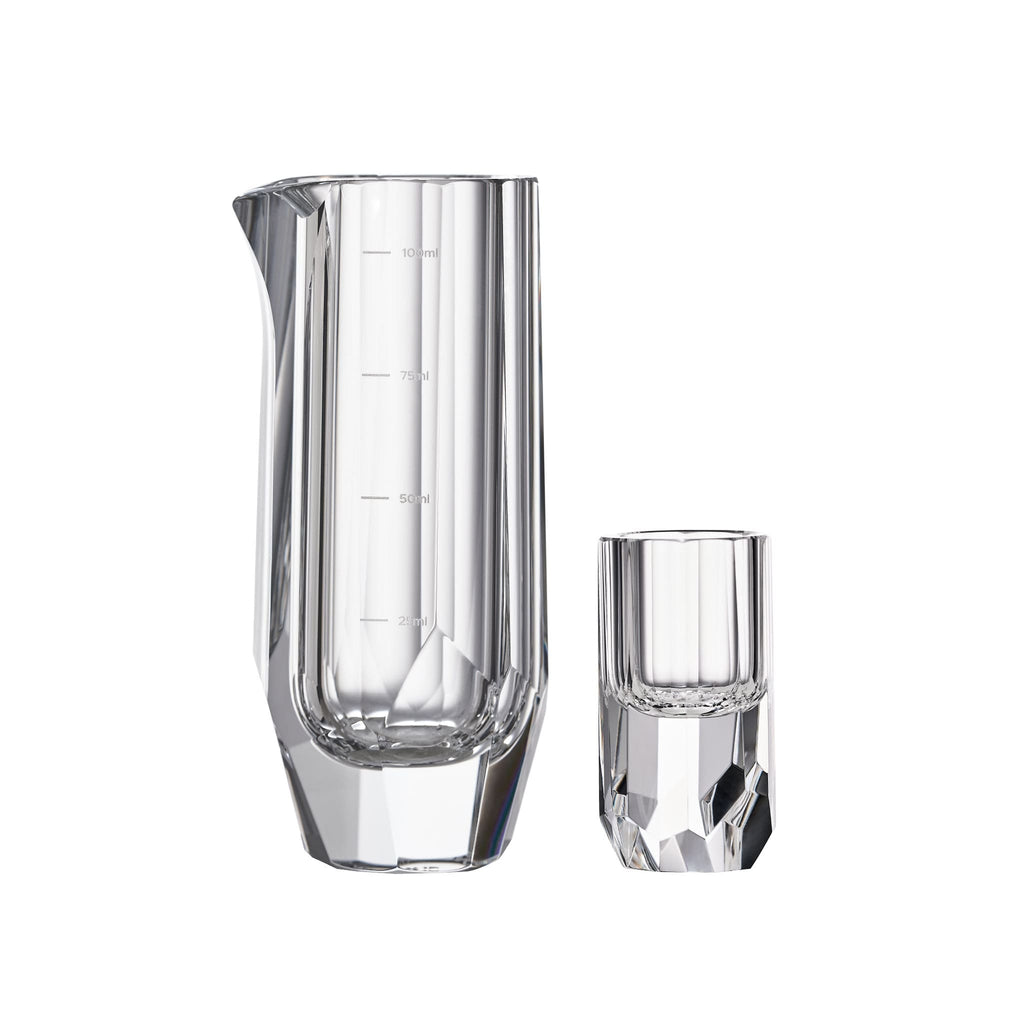 Crystal baijiu glass in soft light with raw diamond-inspired facets and brilliant reflective detail