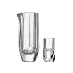 Crystal baijiu glass in soft light with raw diamond-inspired facets and brilliant reflective detail