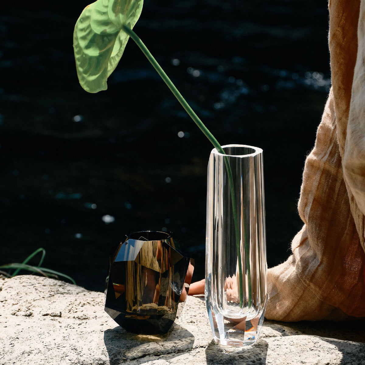 Raw Cullinan Crystal vase styled for a quiet interior ritual with bright reflections and a weighted form