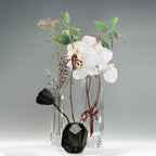Raw Cullinan Crystal vase styled for a quiet interior ritual with bright reflections and a weighted form