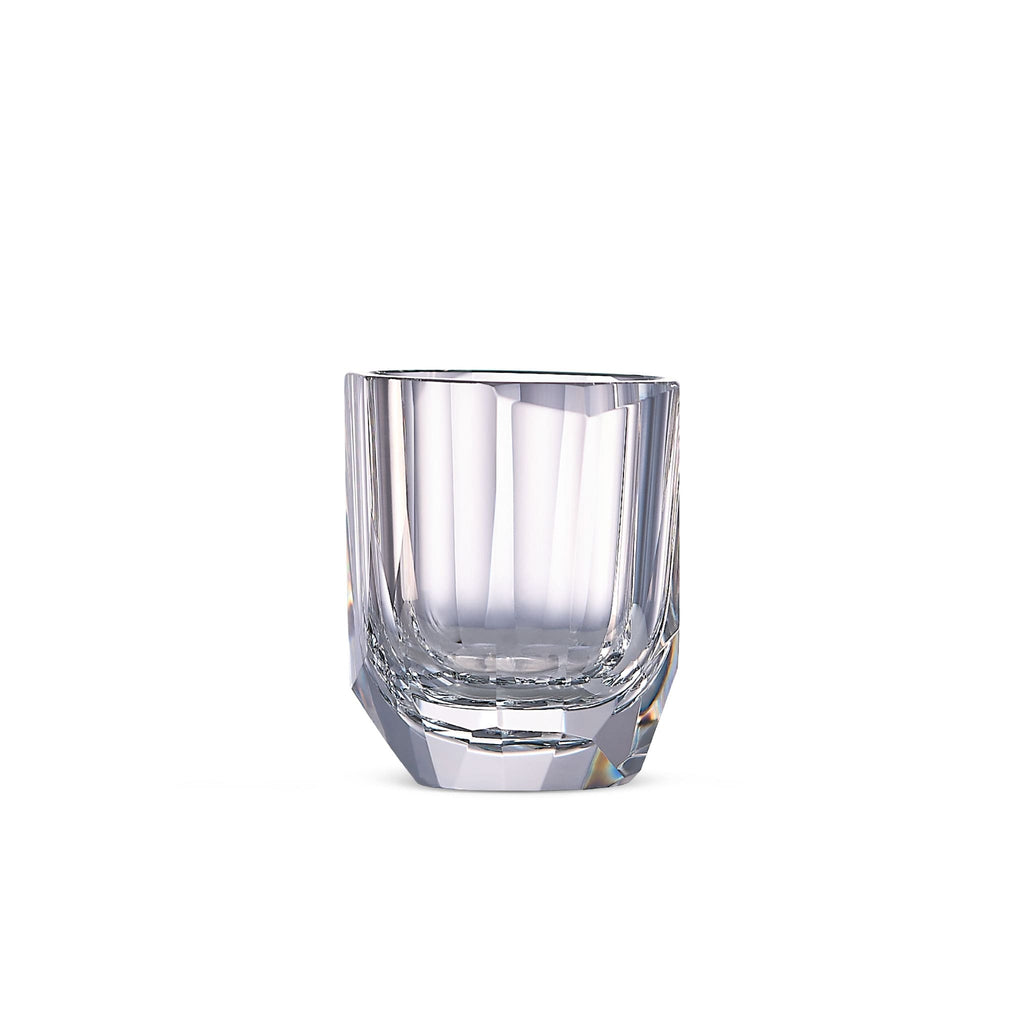Raw Enigma whiskey glass in soft light with raw diamond-inspired facets and brilliant reflective detail