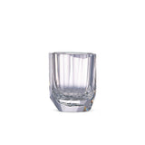 Raw Enigma whiskey glass in soft light with raw diamond-inspired facets and brilliant reflective detail