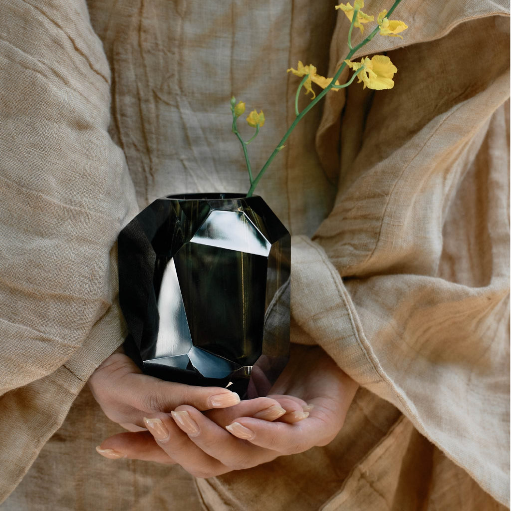 Raw Enigma Crystal vase styled for a quiet interior ritual with bright reflections and a weighted form