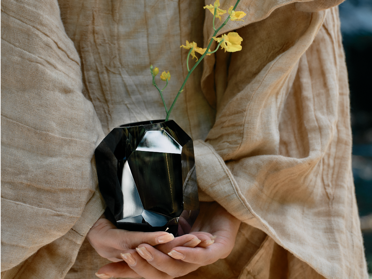 Raw Enigma Crystal vase styled for a quiet interior ritual with bright reflections and a weighted form