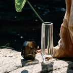 Raw Enigma Crystal vase styled for a quiet interior ritual with bright reflections and a weighted form