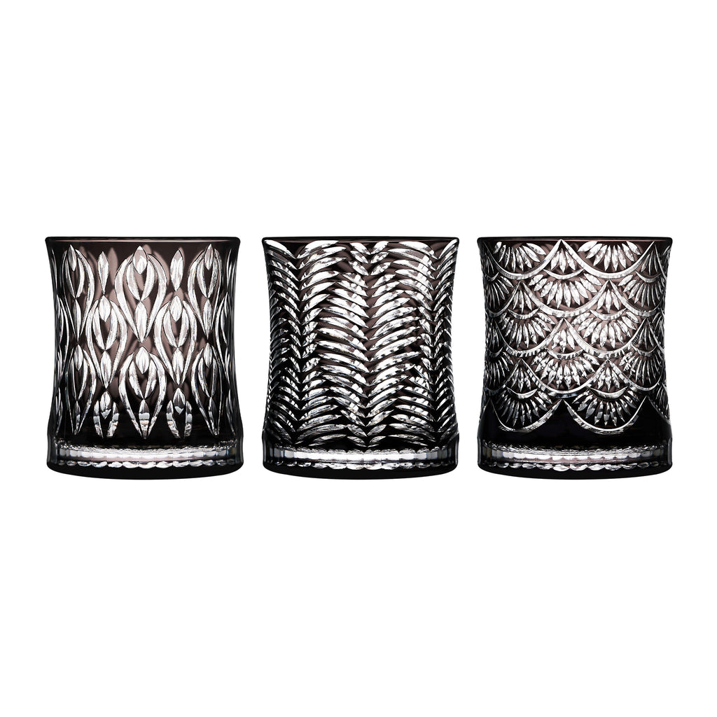 Wild Crystal whiskey glass in soft light with wild animal-inspired carved texture and a bold sculptural silhouette