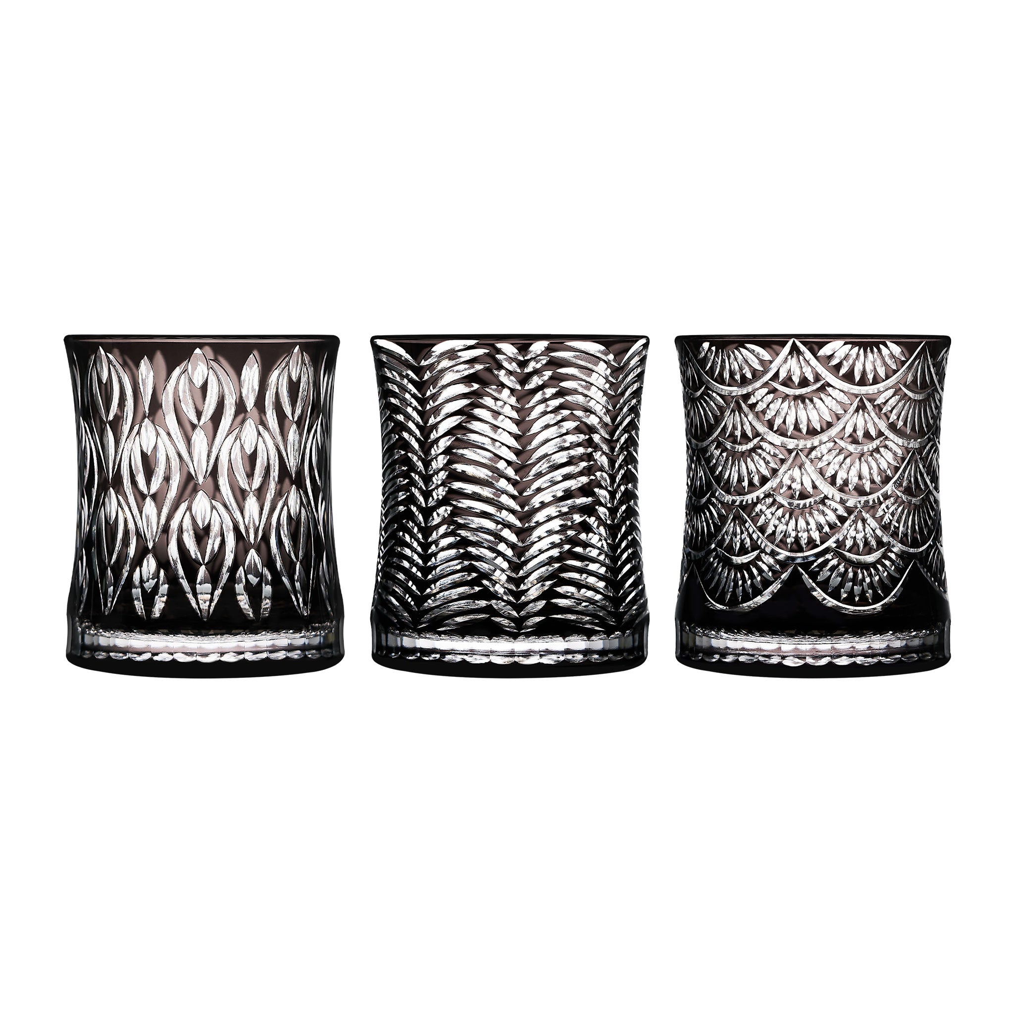 Wild Crystal whiskey glass in soft light with wild animal-inspired carved texture and a bold sculptural silhouette