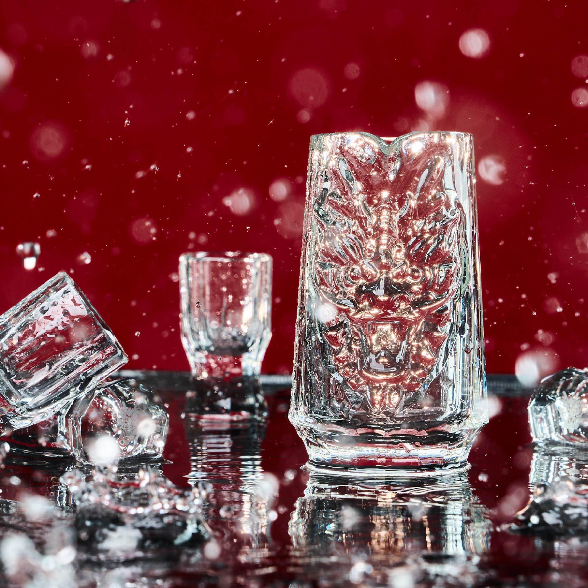 Chinese baijiu gift set styled for a quiet gathering with a sculptural dragon decanter and crystal cups