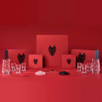 Chinese baijiu gift set styled for a quiet gathering with a sculptural dragon decanter and crystal cups